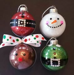 three christmas ornaments in different colors and designs