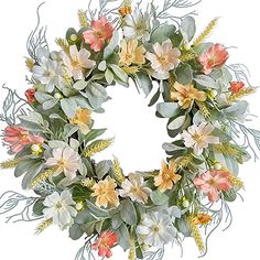 a wreath with flowers and leaves on it