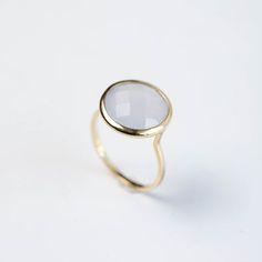 Gemstone ring with Chalcedony natural gemstones in 14K solid gold. A modern and delicate stacking gold ring. A perfect gold ring for women, dainty and subtle that adds glam to every outfit. The best gift for her. 100% handcrafted with love!D E T A I L S● Metal: 14K solid gold, 14K white gold or 14K rose gold● Gemstone: Chalcedony, briolette cut● Stone Diameter: 8mm (0.31in), 10mm (0.4in) and 12mm (0.5in)R I N G ∙ S I Z I N GFor General Reference:● we use standard US Ring Sizing● an average women Elegant White Crystal Ring For Everyday, Elegant Everyday White Crystal Ring, Elegant Gemstone Stackable Rings For Everyday, Elegant Everyday Stackable Gemstone Rings, Elegant Gold Stackable Moonstone Ring, Elegant Gold Moonstone Stackable Ring, Elegant Faceted Moonstone Ring For Anniversary, Elegant Everyday Moonstone Ring With Round Band, Elegant Round Moonstone Ring For Everyday