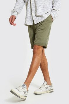 If it's comfort that you're looking for in men's holiday fashion, pick a pair of shorts. You haven't been skipping leg day, have you? No, we know you wouldn't. All the better as you'll want to sport some of our stylish denim shorts, chino shorts, jersey shorts or cargo shorts. If you're looking for new outfit ideas for this summer, consider pairing a horizontal striped t-shirt with jean shorts, or opt for a printed shirt and chino shorts for a smarter combo. Round off with a pair of sliders or loafers, for extra style points.Style: Chino ShortsDesign: PlainFabric: CottonDetail: PlainLength: MidFit: Skinny Green Chino Shorts Mens Outfit, Stone Chinos, New Outfit Ideas, Green Chinos, Mens Holiday, Summer Closet, Tall Men