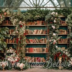 the bookshelf is decorated with flowers and greenery