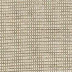 an upholstered beige and white fabric textured with small squares on the outside