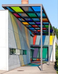 a building with multicolored glass covering it