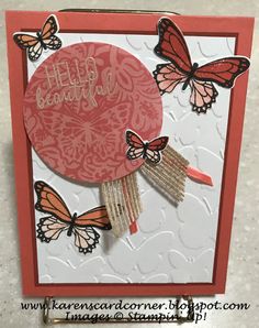 a close up of a card with butterflies on it