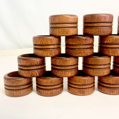 a stack of wooden rings sitting on top of each other