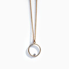 "A symbol of never ending love, our modern open circle necklace is elevated by a tiny floating diamond CZ, set inside the curve. 1.1mm fine gold filled chain with circle measuring 15mm. | Specifications | Material: 14k gold filled Pendant: 1.5cm wide Length: 16\" | 18\" Packaging: Jewelry comes in brand embossed box. | What is 14k gold filled? | 14k gold fill is a fantastic alternative to solid gold as it is a genuine layer of gold permanently bonded onto base metal with heat and pressure. It is Bar Bracelet Personalized, Silver Bar Bracelet, Raw Quartz Necklace, Diamond Circle Necklace, Open Circle Necklace, Herkimer Diamond Necklace, Packaging Jewelry, Necklace With Diamond, Gold Circle Necklace