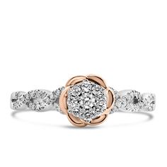 Celebrate a tale as old as time with this beautiful enchanted rose 10kt ring featuring .25 carat TW of diamonds and stunning rose halo. Inspired by Belle, this ring is featured in our Enchanted Disney Fine Jewelry collection. Experience the enchantment of Disney’s Belle with this captivating ring from the Enchanted Disney collection. Crafted in 10kt white and rose gold, this exquisite ring features a total of .25 carat diamonds, embodying the timeless elegance of Belle herself. This enchan Belle Ring, Disney Engagement Rings, Enchanted Disney, Enchanted Disney Fine Jewelry, Disney Belle, Disney Film, Enchanted Rose, Tale As Old As Time, Belle Disney