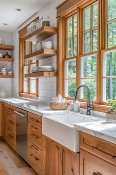 a kitchen with wooden cabinets and white counter tops, along with open shelving above the sink