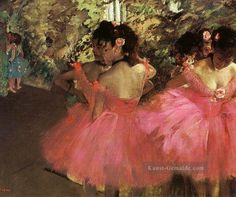 three young ballerinas in pink tutu skirts