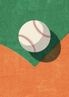 a baseball sitting on top of a green field