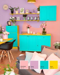 a living room filled with furniture and colorful walls