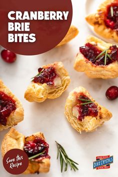 cranberry brie bites with rosemary garnish on top and text overlay