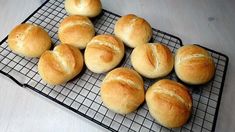 nine rolls on a cooling rack ready to be baked into buns or breadsticks