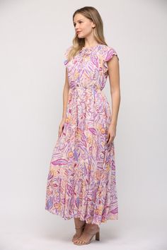 This dress is a botanical dream with its stunning lavender floral woven fabric. It's the perfect dress for any occasion, from work to weddings. Classic and comfortable, pair it with a simple heel for an eye-catching look. Lavender Multi floral woven Smocked detail at neck Button detail at the top Flutter sleeves Super flowy fit with tie at the waist The material is 100% Rayon. The dress runs true to size. The dress is very flowy and relaxed, cinch the waist with the tie. The model is 5'10" and i Sunday Dresses, Lavender Dress, Lavender Dresses, Lavender Floral, Sweater Tank Top, Dress Trousers, Bottom Clothes, Flutter Sleeves, Clothes Collection