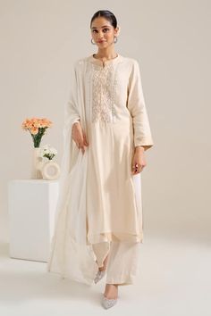 Ivory ombre long kurta featuring sequin embroidered neckline. Paired with a co-ordinating pant. - Aza Fashions Off White Silk Long Sleeve Kurta, Elegant Off White Kurta For Spring, Elegant Off White Kurta With Dabka Work, Spring Cream Chanderi Salwar Kameez, Cream Straight Kurta For Spring, Elegant Off White Cotton Silk Kurta, Elegant Off-white Cotton Silk Kurta, Elegant Off-white Salwar Kameez With Straight Kurta, Spring Cream Straight Kurta Traditional Wear