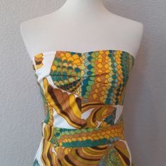 Get Ready For Some Serious Summer Glamour Courtesy Of Banana Republic's Collection With Trina Turk, Queen Of Bold Prints And California Sunshine. Gorgeous Strapless Dress By Trina Turk For Banana Republic. Dress Is Fully Lined. Zipper Is Down Middle. Strapless Paisley Pattern Dress. Excellent Condition. Funky, Fun Retro Pattern. Shell 98% Cotton 2% Elastane Lining 95% Polyester 5% Elastane Bin 002-0048 Retro Fitted Strapless Dress, Fitted Retro Strapless Dress, Yellow Strapless Beach Dress, Retro Strapless Summer Dress, Strapless Retro Summer Dress, Yellow Fitted Strapless Dress For Spring, Yellow Retro Mini Dress For Party, Yellow Fitted Strapless Mini Dress, Retro Yellow Mini Dress For Party