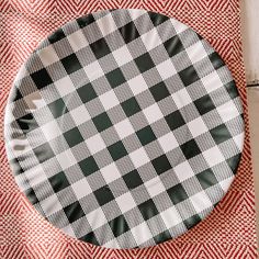 a black and white checkered paper plate