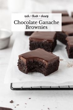 chocolate ganache brownies on a white plate