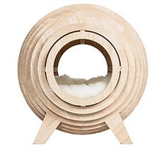 a circular wooden object on a white background