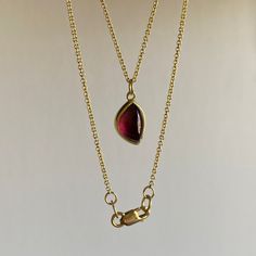 Whimsical yet tantalizing, this foliage-shaped garnet is simply unforgettable. 22k & 18k yellow gold Rhodolite garnet 7mm x 10mm (1/4" x 7/16")1.3mm cable chain is adjustable and can be worn at 17" or 20" Newport Ri, Rhodolite Garnet, Leaf Pendant, Cable Chain, Newport, Garnet, Fine Jewelry, Cable, Yellow Gold