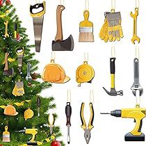 a christmas tree with various tools hanging from it