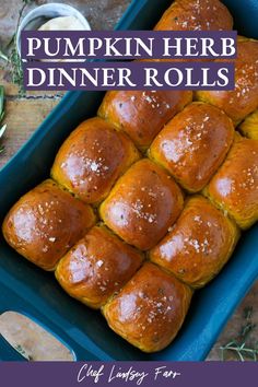 pumpkin herb dinner rolls in a blue casserole dish