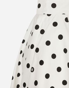 Stretch cotton drill calf-length circle skirt with polka-dot print: Black and white High-waisted Unlined Rear zipper and hook-and-eye fastening The piece measures 65 cm from the waist down on a size IT 40 The model is 175 cm tall and wears a size IT 40 Made in Italy The difference in the print placement that you may find on this product is a feature of Dolce & Gabbana’s “Handmade” pieces. A detail that makes every garment or accessory unique and exclusive. Wide Leg Jeans Cropped, Races Outfit, Straight Leg Jeans Men, Calf Length Skirts, Latest Skirts, Print Black And White, Floor Length Skirt, Fur Coats Women, Polka Dot Skirt