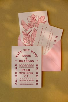 wedding stationery with pink envelopes and save the date cards