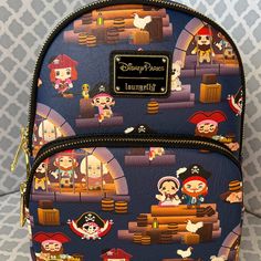 the back pack is decorated with cartoon characters