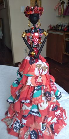 a dress made out of fabric on top of a table