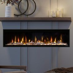 an electric fireplace with many lit flames