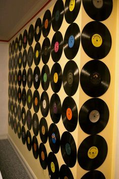 there are many records on the wall