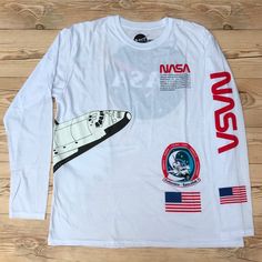 Brand New Without Tags Nasa Long Sleeve T-Shirt Men’s Size Xl 9578, 2b Casual Long Sleeve Shirt With Logo Print, Long Sleeve Graphic Tee With Front Print, Graphic Tee With Front Print Long Sleeve, Casual Crew Top With Front Print, Casual Crew Neck Top With Front Print, Casual Crew Shirt With Letter Print, Casual Crew Neck Shirt With Letter Print, White Long Sleeve Top With Front Print, Nasa Clothing