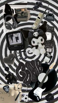 a collage of various items arranged in the shape of a spiral with black and white stripes