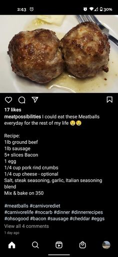 two meatballs sitting on top of a white plate