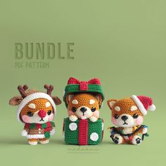 three small crocheted animals wearing christmas outfits