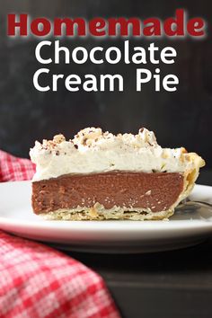 a piece of chocolate cream pie on a white plate