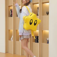 Yellow Star Backpack Introducing our star-shaped backpack made of yellow PU leather! This backpack is not only eye-catching and unique, but it's also water-resistant and durable, ensuring your belongings stay protected from the elements. The adjustable straps provide a comfortable fit for different body types, while the zipper closure keeps your belongings safe and secure This backpack is versatile and can be used as a school backpack for teenagers, a daypack for outdoor activities like hiking o Star Backpack, Star Cartoon, Backpack Cute, Y2k Design, Cartoon Backpack, Real Leather Bags, Yellow Star, Outdoor Backpacks, Novelty Bags