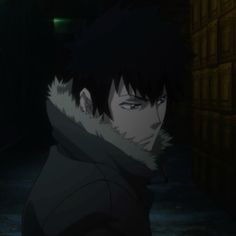 an anime character with black hair and blue eyes looking at something in the dark room