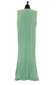 Luxury awaits you in our beautiful Spring Green Essential Maxi. This gorgeous maxi is adorned with authentic Swarovski crystals and is the perfect hue for your spring and summer wardrobe. Stand out from the crowd and wear this beautiful sleeveless maxi. Made with luxurious Nida fabric Wide-cut for a modest fit Single closure jewel neck collar Made with authentic Swarovski Crystals Sleeveless, lightweight, and breathable Wardrobe Stand, Garment Workers, Modest Fits, Jewel Neck, Spring Green, Neck Collar, Summer Wardrobe, Sheath Dress, Swarovski Crystals