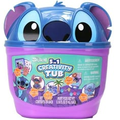 a blue and purple toy with big eyes