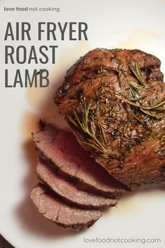 there is a plate with some meat on it and the words air fryer roast lamb