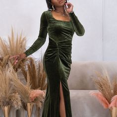 The Velvet Maxi Dress is long line dress in emerald green and is designed with the illusion of a rouched wrap feature. The dress includes a flattering rounded square neckline, fitted long sleeves and thigh high front slit.  The dress is a stretchy, hugs in all the right places and fastens in a centre back invisible zip.  The dress is often worn at special occasions, and especially makes a perfect wedding guest look. Cold Wash - Wash on a cool temperature, 30 degrees  Do Not Tumble Dry  Medium He Velvet Maxi Dress, Velvet Maxi, Rounded Square, Wedding Guest Looks, Matches Fashion, Invisible Zip, Line Dress, The Velvet, Independent Designers Fashion