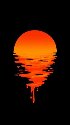 an orange and black sunset reflecting in the water