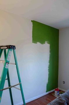 a ladder with green paint on it and the words how to paint without tape above it