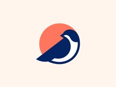 a bird sitting on top of an orange and blue circle