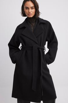 Belted Coat Black Luxury Black Belted Wool Coat, Luxury Classic Belted Outerwear, Luxury Women's Belted Wool Coat, Winter Belt Wool Coat, Luxury Winter Outerwear With Tie Waist, Luxury Long Coat With Belt, Luxury Long Sleeve Wool Coat With Self Belt, Black Belt Coat, Luxury Belted Long Coat