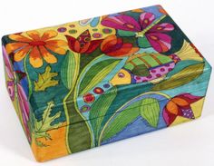 an artisticly painted wooden box with flowers and fish design on it's lid