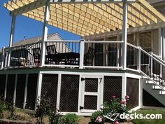 a house with a deck and patio attached to it