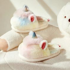 These cozy Winter Kids Plush Unicorn Slippers are sure to bring a smile to your child's face. Made with soft and plush material, these slippers are designed to keep little feet warm and comfortable. The adorable unicorn design adds a touch of fun to any day. Perfect for lounging at home or for a sleepover with friends. Slippers Cartoon, Cartoon Home, Plush Unicorn, Unicorn Slippers, School Pens, Spinner Toy, Plush Slippers, Cartoon Unicorn, Unicorn Kids